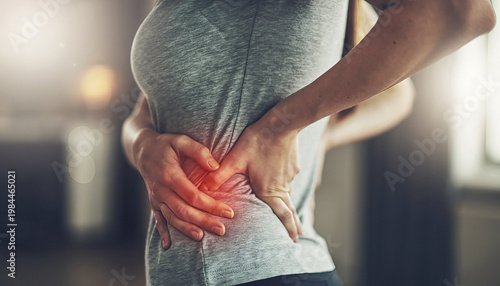 Woman Clutching Lower Back Pain