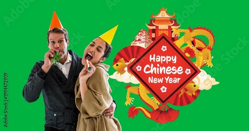 Couple wearing party hats with party blowers and happy chinese new year text banner