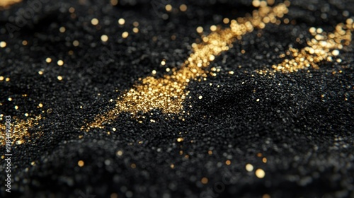 Black sand with gold glitter