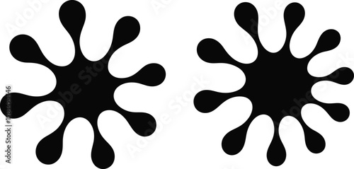 Two black abstract ink splash shapes with multiple rounded arms on a white background