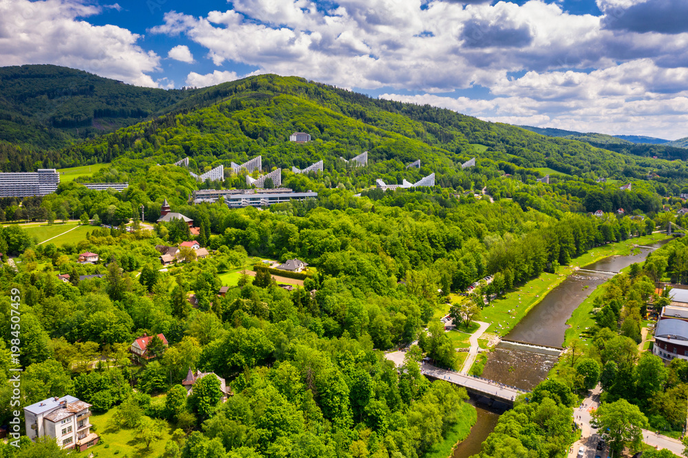 Obraz premium The town and spa town of Ustron nestled in the hills of the Silesian Beskids. Poland