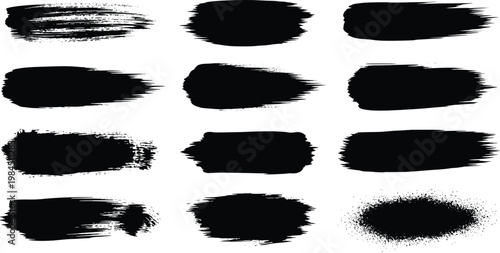 Collection of black brush strokes and smudges on white background