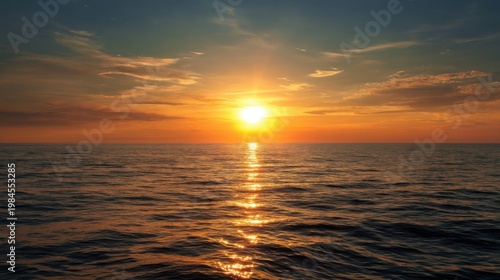 Golden sunset over calm ocean, orange sky, shimmering reflections, peaceful horizon, radiant light path.