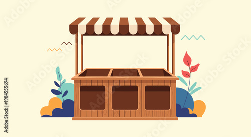Empty wooden market stall with a striped brown and white awning stands ready for display in a garden setting with flat plants.