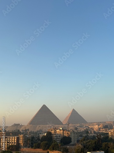 Iconic Pyramids of Egypt Under Clear Morning Sky 