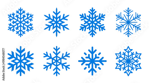 Collection of blue snowflakes on white.