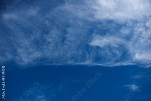 Foto Soft White Clouds On Deep Blue Sky Natural Background