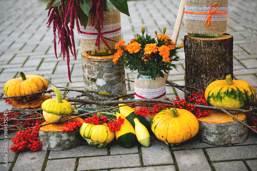 Autumn Harvest Display With Pumpkins And Berries Outdoors