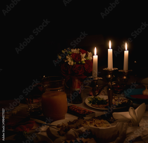 Romantic Candlelight Dinner Scene With Flowers And Warm Glow
