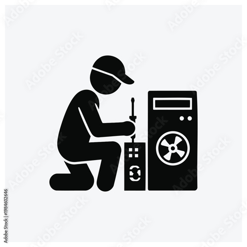 Silhouette of technician repairing computer