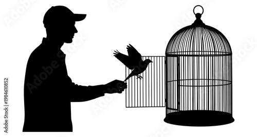 Silhouette man releasing bird from cage during freedom concept