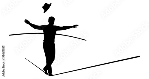 Silhouette of a man balancing on a tightrope with his hat tossed in the air during a performance
