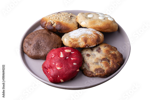 Assorted cookies on a plate isolated over white background