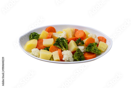 Cooked vegetables in a plate isolated over white background