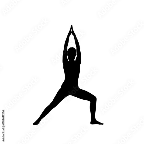 Black silhouette of a woman performing the warrior one yoga pose.