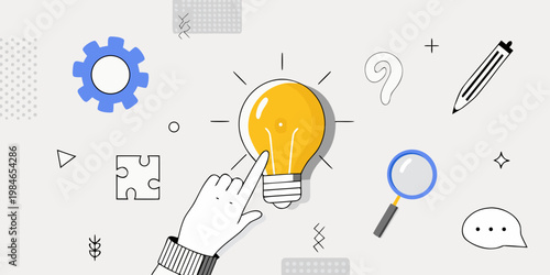 A hand pointing towards a glowing lightbulb with creative concept icons