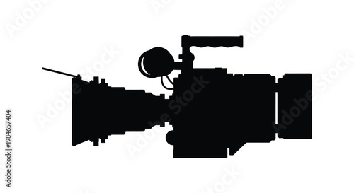 A black silhouette of a professional video camera with accessories silhouette