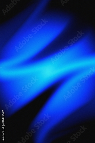 Vibrant blue light streaks on a dark background with glowing effect