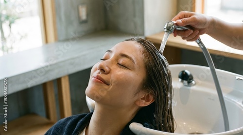 Woman Receiving a Hair Wash in Salon