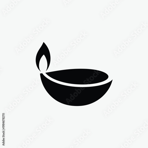 Simple black silhouette of a traditional oil lamp with a flickering flame