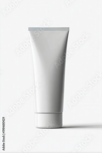 Minimalist white tube stands against clean backdrop