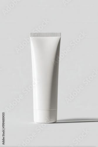 Minimalist white tube stands upright