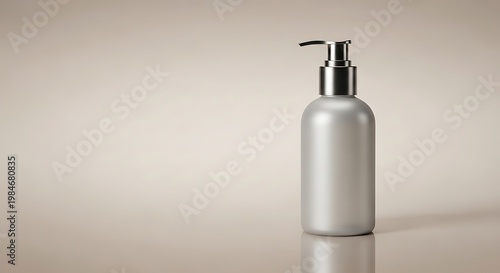 Sleek and minimalist pump dispenser bottle with a sophisticated metallic cap, ideal for beauty, cosmetic, or personal care products, captured with soft lighting on a reflective surface