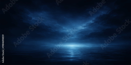 Dramatic dark clouds gather over a stormy blue sea under a moonlit night sky where nature creates an atmospheric landscape of light and shadow