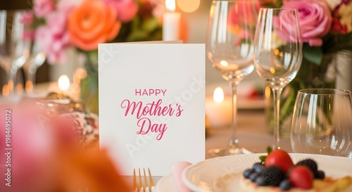 Mother's day table setting with flowers and a festive card