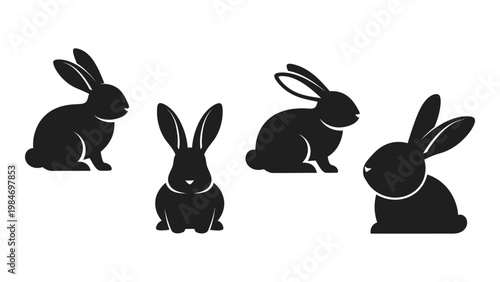 Four black silhouettes of rabbits in varying poses are displayed on a white background