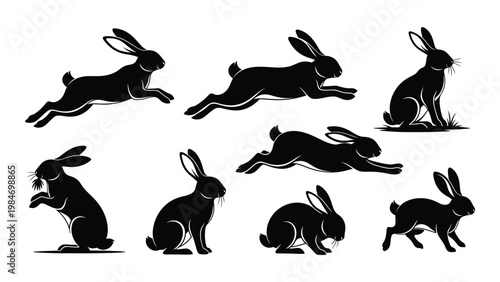A collection of black silhouette rabbits in various dynamic poses and positions