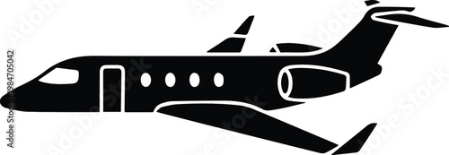 A sleek black silhouette of a private jet in flight showcasing its streamlined design and powerful engines