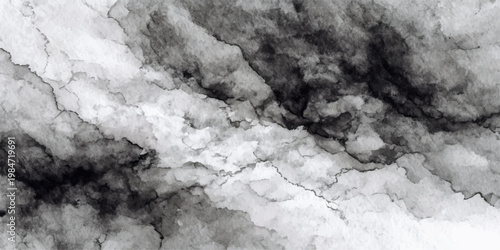 An abstract black and white marble texture blends with fluffy white clouds and vintage grunge patterns to create a cold winter nature background