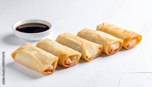 Perfectly Golden Spring Rolls with Crisp Wrappers, Served with Soy Sauce Dip