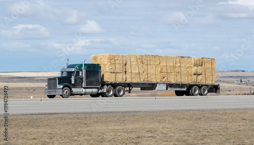 Heavy Cargo on the Road. A truck transporting cargo along a highway. Taken in Alberta, Canada