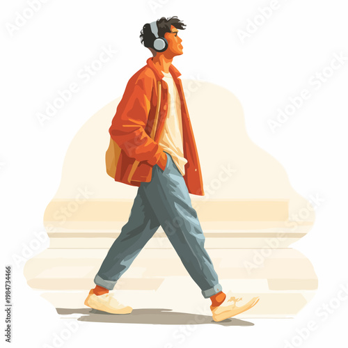 Man walking down street wearing headphones and casual clothes