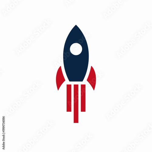 A navy blue rocket ship blasts off with red fins and stabilizers