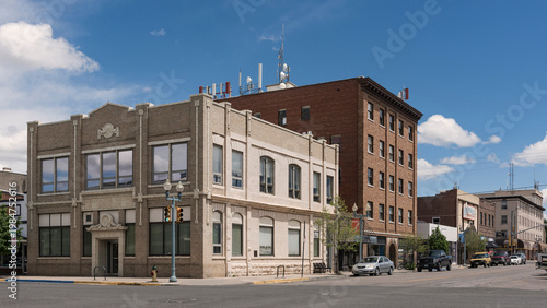 Pre-war downtown buildings with rooftop communication antennas