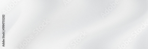 White gray satin texture that is white silver fabric silk panorama background with beautiful soft blur pattern natural.