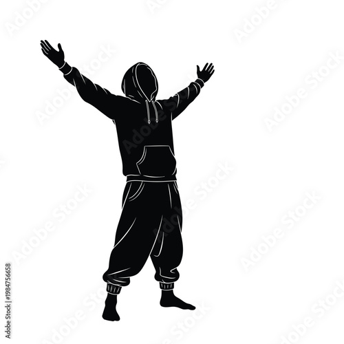 Person wearing hoodie and sweatpants with arms raised in celebration