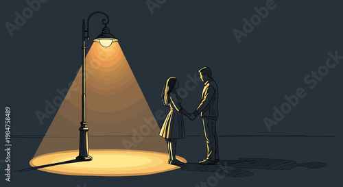 Couple standing under a street lamp at night.