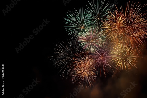 a vibrant fireworks display illuminates the night sky with colorful explosions of light and energy