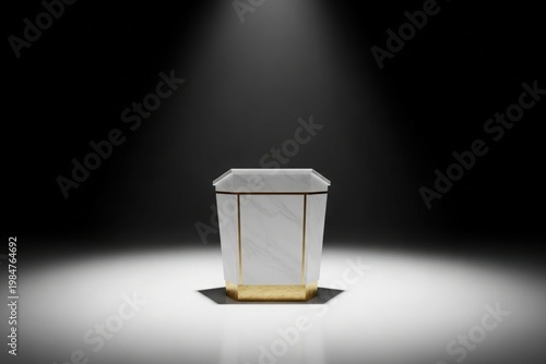 Luxury white marble podium with gold accents in spotlight