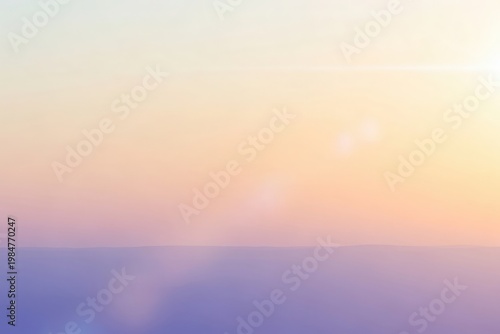 Soft pastel sunset gradient background with lens flares and bokeh