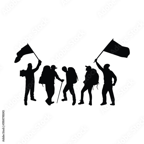 Silhouette group of hikers with flags and hiking poles.