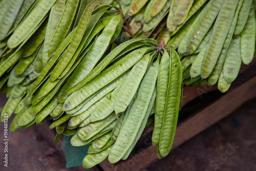 Fresh beans piled high in a woven basket at a Mexican market in San Cristobal de las Casas, Chiapas.