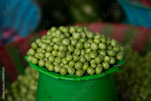Fresh beans piled high in a woven basket at a Mexican market in San Cristobal de las Casas, Chiapas.
