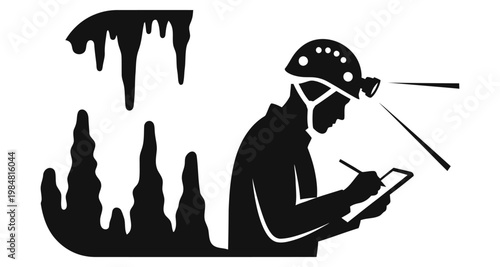 Caving exploration silhouette with helmet light and tablet in cave formations