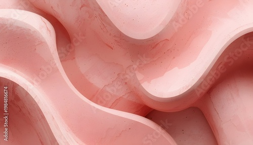 A close-up view of a pink, wavy, abstract sculpture with a smooth, glossy finish and subtle texture.
