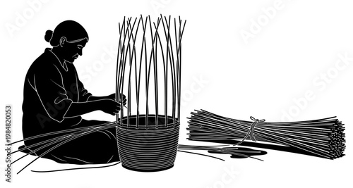 Woman weaving basket with reeds during daylight silhouette